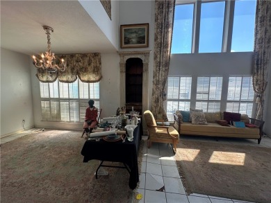 Nestled along a wide canal in Corpus Christi, this 3-bedroom, 2