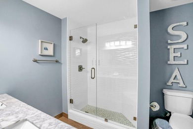Enjoy effortless beach living from this beautifully updated - photo 15