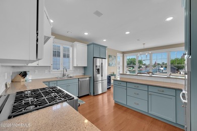 Stunning custom-designed 4BR, 3BA waterfront home on a wide - photo 13