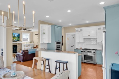Stunning custom-designed 4BR, 3BA waterfront home on a wide - photo 14