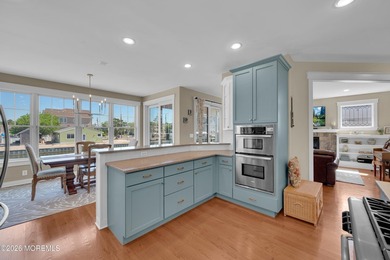 Stunning custom-designed 4BR, 3BA waterfront home on a wide - photo 15