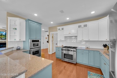 Stunning custom-designed 4BR, 3BA waterfront home on a wide - photo 16