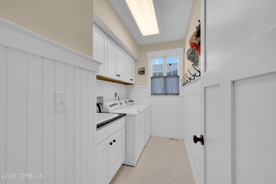 Stunning custom-designed 4BR, 3BA waterfront home on a wide - photo 19