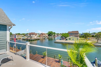 Stunning custom-designed 4BR, 3BA waterfront home on a wide - photo 24