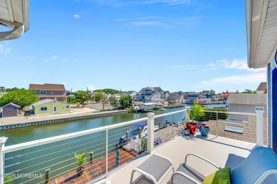 Stunning custom-designed 4BR, 3BA waterfront home on a wide - photo 25