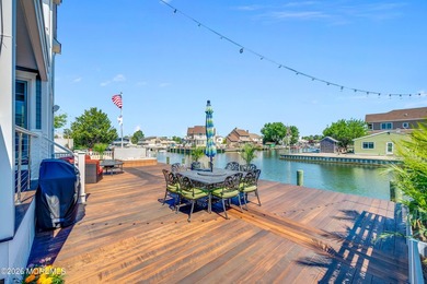 Stunning custom-designed 4BR, 3BA waterfront home on a wide - photo 47