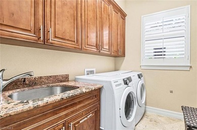 This exceptional single story Moorings residence offers a - photo 23