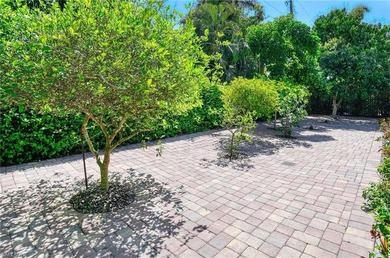 This exceptional single story Moorings residence offers a - photo 33