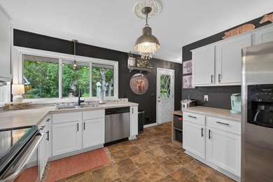 Welcome home to this beautifully updated 4-bedroom, 2-bath - photo 10