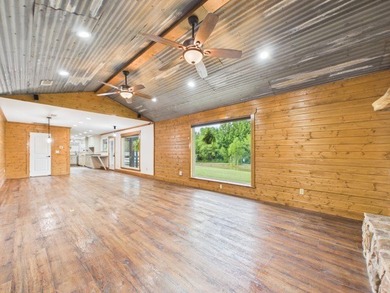 Custom steel-frame home with guest quarters, shop, pool, pond & - photo 10