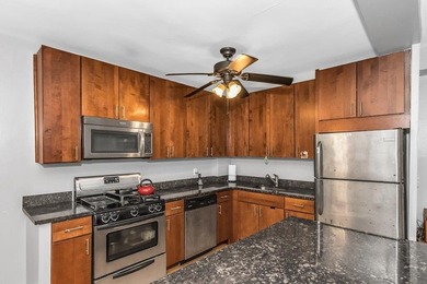 Discover modern living in this stylish two-bedroom, one and a - photo 8