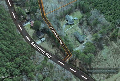 Tucked away off the road and surrounded by woods, this property - photo 3