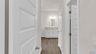 This stunning residence features 4 spacious bedrooms, 3 elegant - photo 34