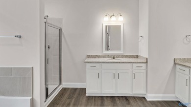 This stunning residence features 4 spacious bedrooms, 3 elegant - photo 35