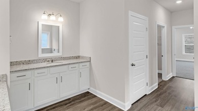 This stunning residence features 4 spacious bedrooms, 3 elegant - photo 36