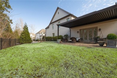 This picturesque 32-home enclave is tucked away on a quiet