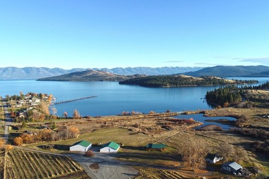 Experience the ultimate Flathead Lake retreat with this rare and - photo 2