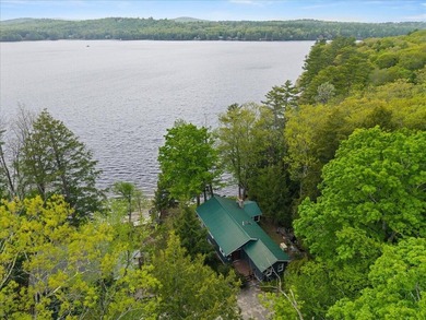 Located on Long Lake in Harrison, Maine, this exceptional - photo 3