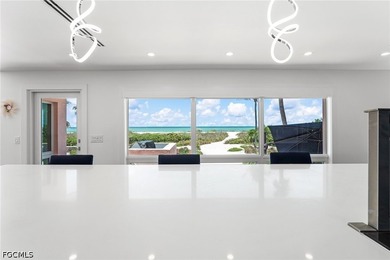 Experience the ultimate in beachfront living at 4577 Waters Edge - photo 16