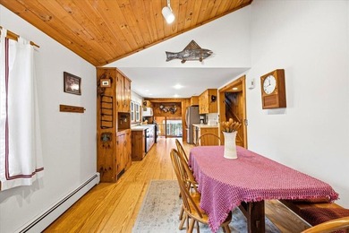 Located on Long Lake in Harrison, Maine, this exceptional - photo 9