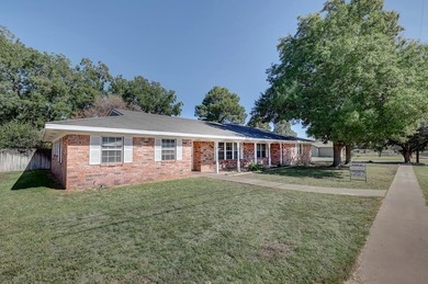 This beautifully crafted custom home sits on a large corner lot - photo 1