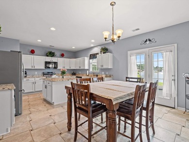 Welcome to this spacious three-story home with peaceful pond - photo 11