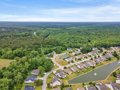 Welcome to this spacious three-story home with peaceful pond - photo 37