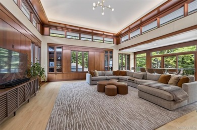 Perched above Oyster Bay Harbor on 4.04 private acres in the - photo 11