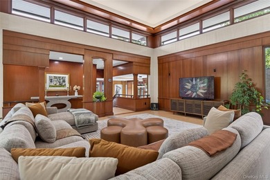 Perched above Oyster Bay Harbor on 4.04 private acres in the - photo 12
