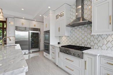 Perched above Oyster Bay Harbor on 4.04 private acres in the - photo 21