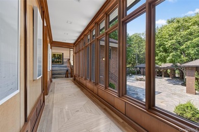 Perched above Oyster Bay Harbor on 4.04 private acres in the - photo 28