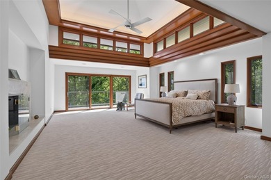 Perched above Oyster Bay Harbor on 4.04 private acres in the - photo 31