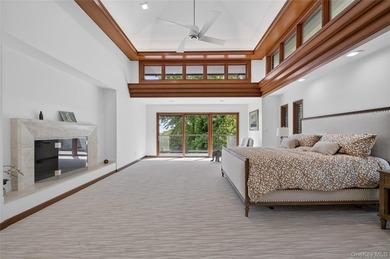 Perched above Oyster Bay Harbor on 4.04 private acres in the - photo 32