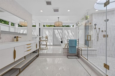Perched above Oyster Bay Harbor on 4.04 private acres in the - photo 33