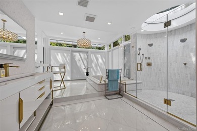 Perched above Oyster Bay Harbor on 4.04 private acres in the - photo 34