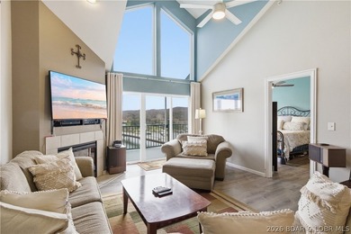 Top-floor condo with soaring vaulted ceilings and dramatic - photo 11