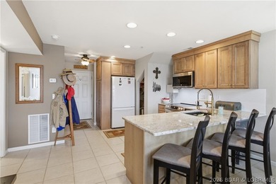 Top-floor condo with soaring vaulted ceilings and dramatic - photo 17