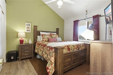 Top-floor condo with soaring vaulted ceilings and dramatic - photo 20