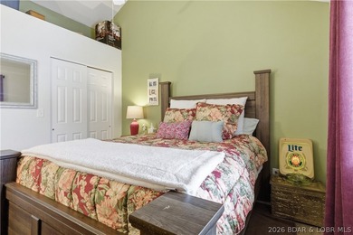 Top-floor condo with soaring vaulted ceilings and dramatic - photo 22