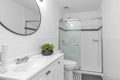 Welcome to Elevated Coastal Living in this Beautiful Updated 1 - photo 11