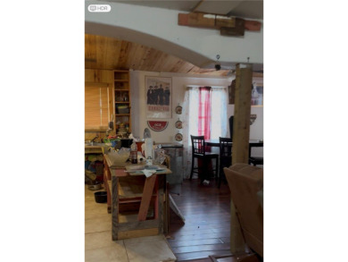 This charming 2-bedroom, 2-bath home sits on 1.87 acres and