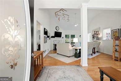 Step inside to discover extensive renovations throughout - photo 3