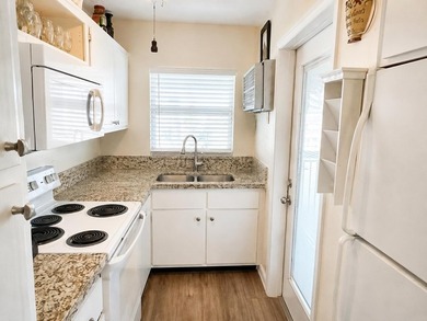 LOCATED IN THIS 55 PLUS COMMUNITY OF SHORE CLUB. THIS TURNKEY 2 - photo 3