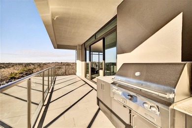 Set above the Buckhead skyline, this refined residence at The