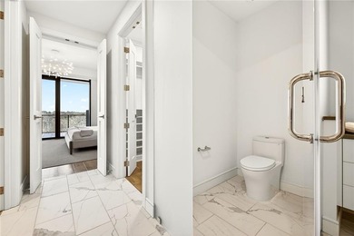 Set above the Buckhead skyline, this refined residence at The