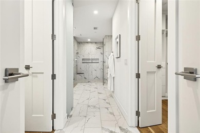 Set above the Buckhead skyline, this refined residence at The