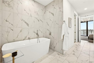 Set above the Buckhead skyline, this refined residence at The