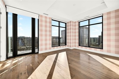 Set above the Buckhead skyline, this refined residence at The