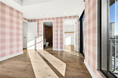 Set above the Buckhead skyline, this refined residence at The