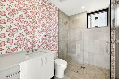 Set above the Buckhead skyline, this refined residence at The